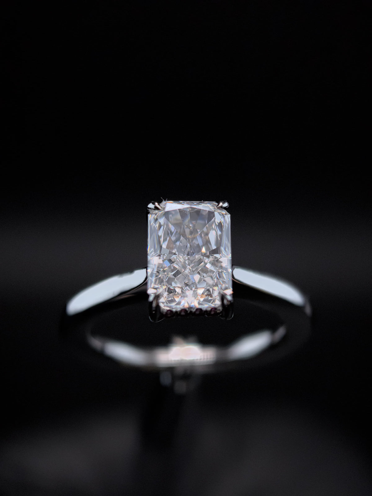 Sculpted radiant diamond engagement ring by RIAZ