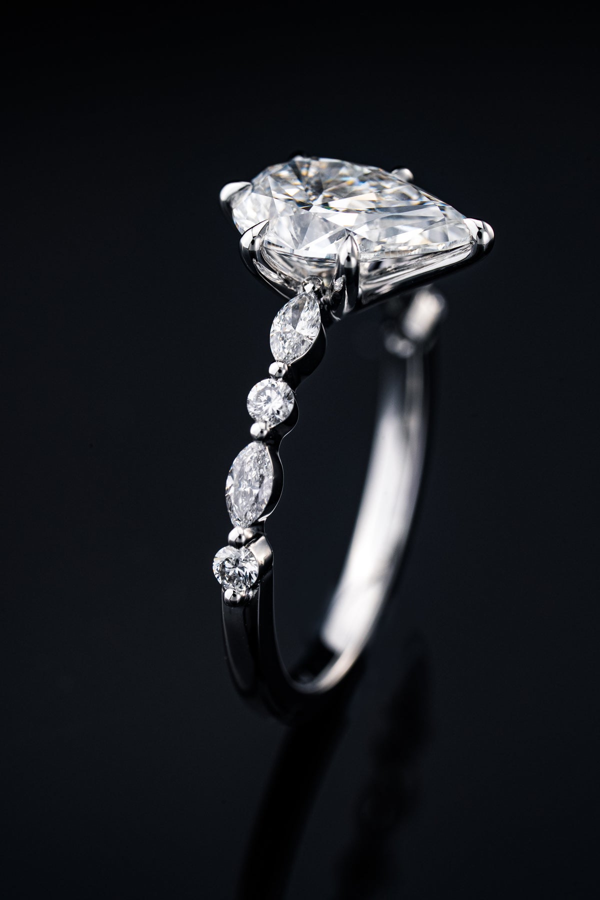 Round diamond engagement ring by RIAZ