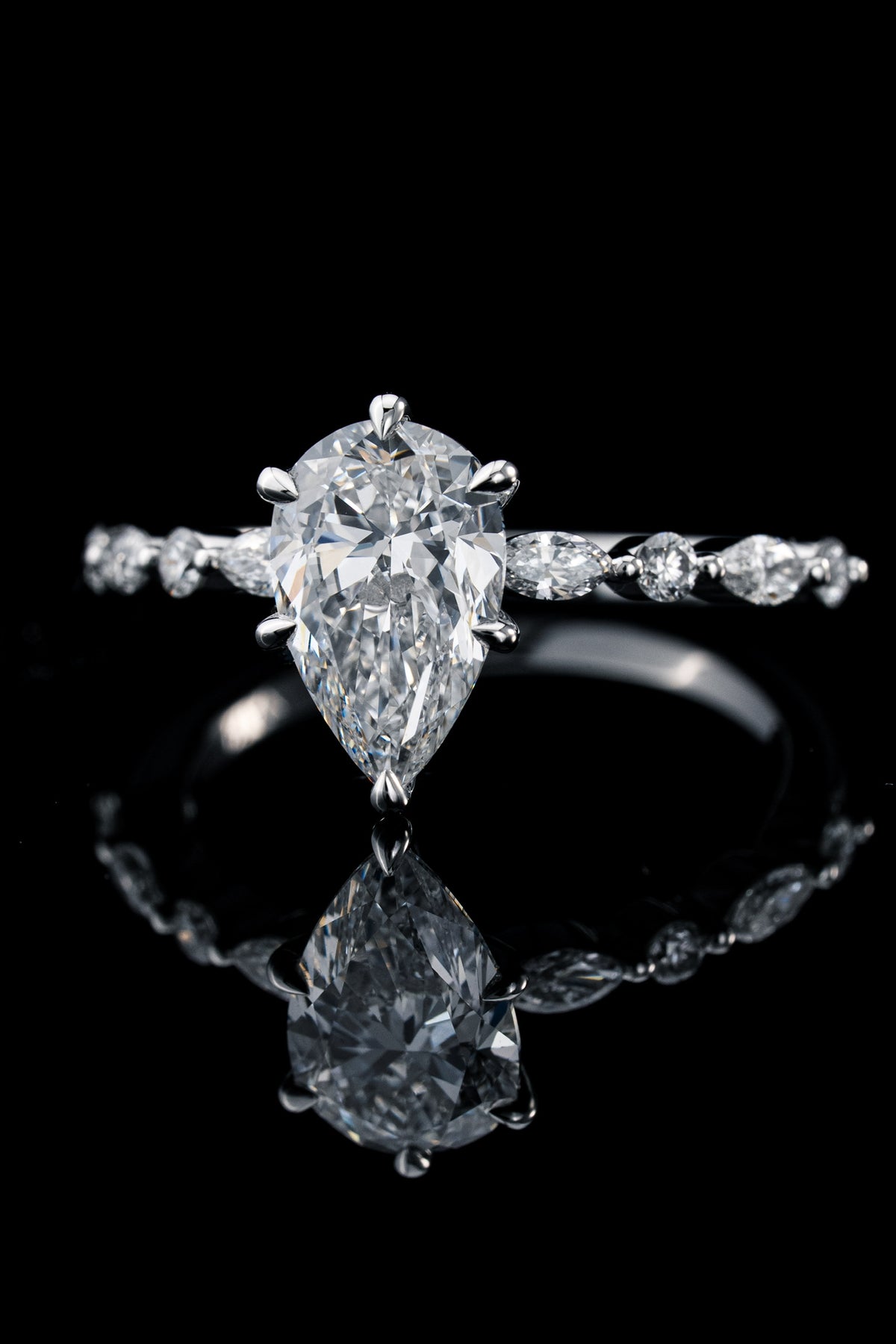 Round diamond engagement ring by RIAZ