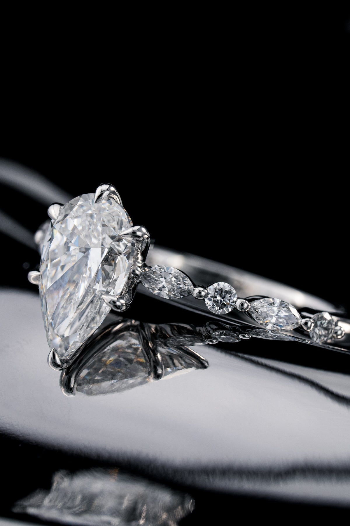 Round diamond engagement ring by RIAZ