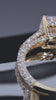 Radiant diamond engagement ring rotating in a clean RIAZ commission film