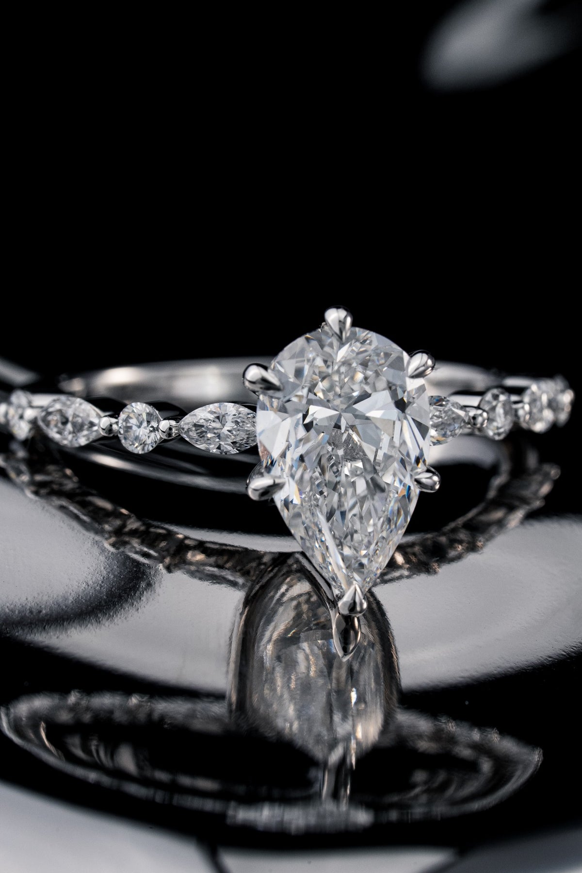 Pear-shaped diamond engagement ring by RIAZ