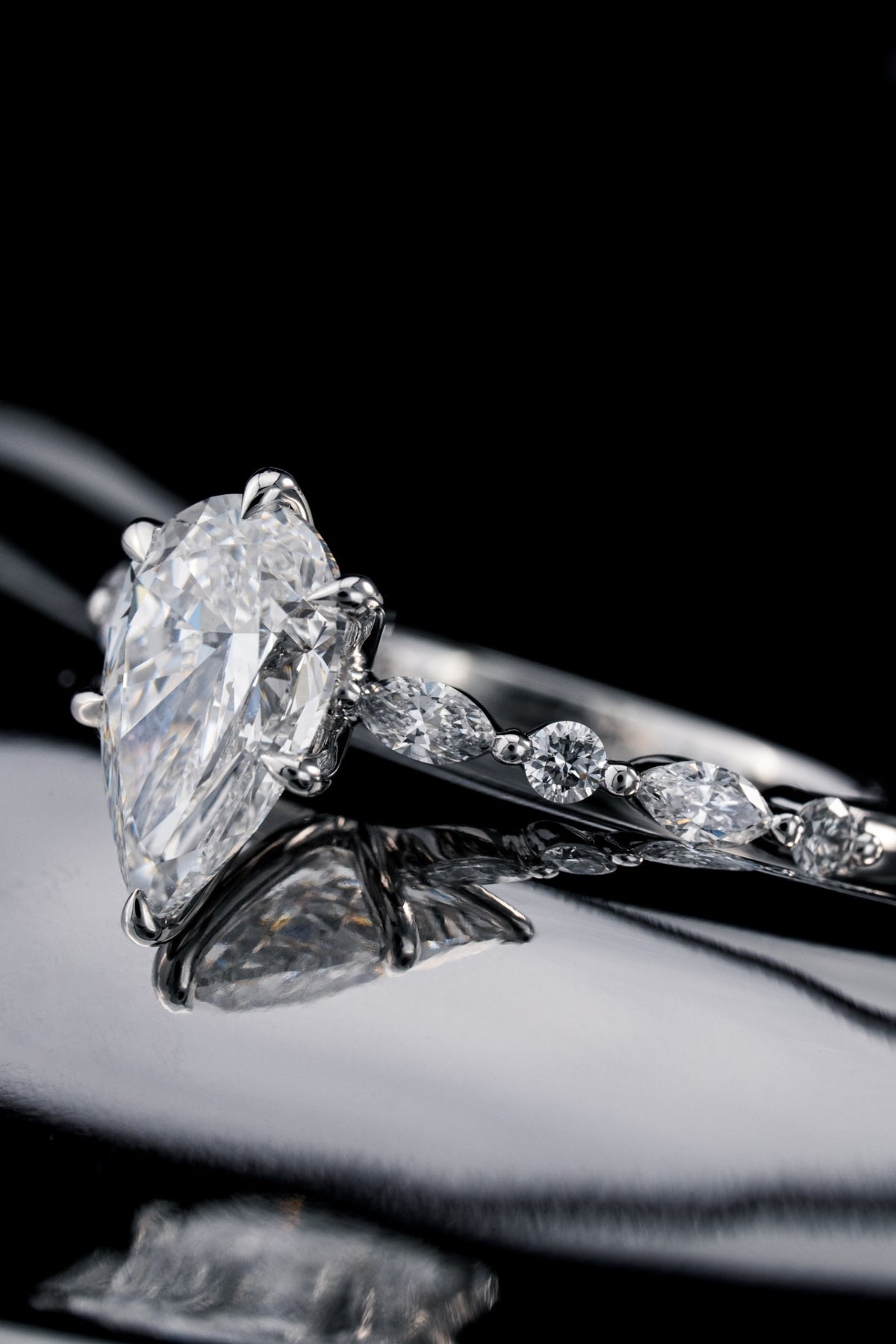 Pear-shaped diamond engagement ring by RIAZ